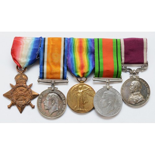 682 - WWI-WWII mounted medal group, to include the George V Long Service and Good Conduct, 1914 Mons Star,... 