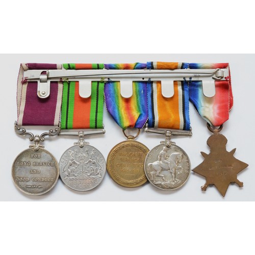 682 - WWI-WWII mounted medal group, to include the George V Long Service and Good Conduct, 1914 Mons Star,... 