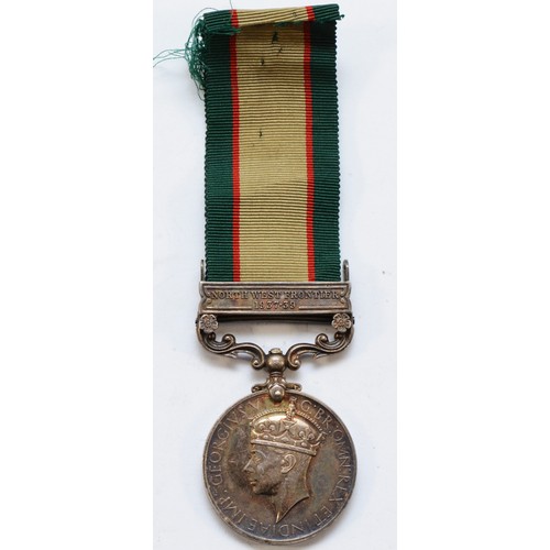 690 - A George VI North Western Frontier 1937-1939 medal, presented to 7013707 RFMN. T. E. Matthews. R. U.... 