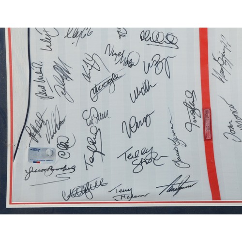 139A - An authentic licensed England football shirt, 2001-2003, bearing forty five signatures, inclduding B... 