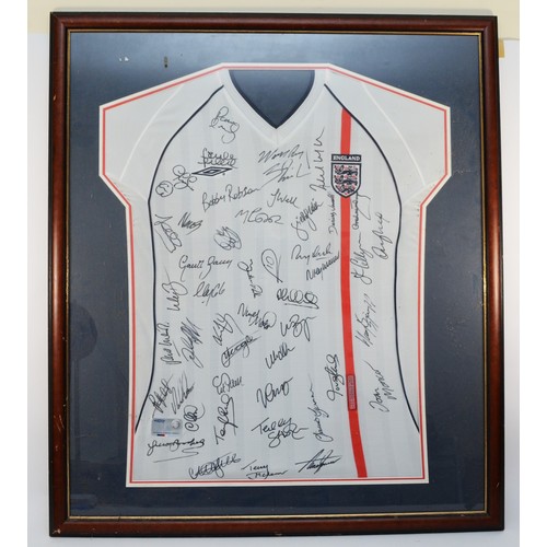 139A - An authentic licensed England football shirt, 2001-2003, bearing forty five signatures, inclduding B... 