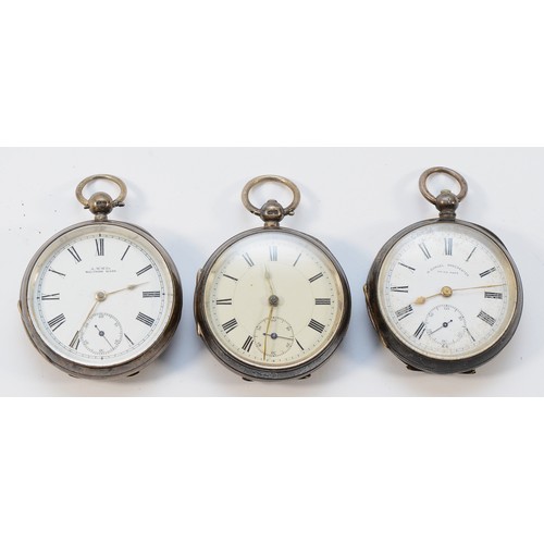 12 - Three silver open face pocket watches, two working when catalogued (3)