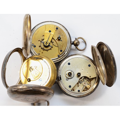 12 - Three silver open face pocket watches, two working when catalogued (3)