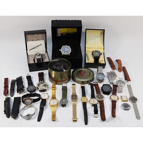 35 - A collection of fashion watches to include G Shock, WR200M, tin, Guess and Wingmaster, spares or rep... 