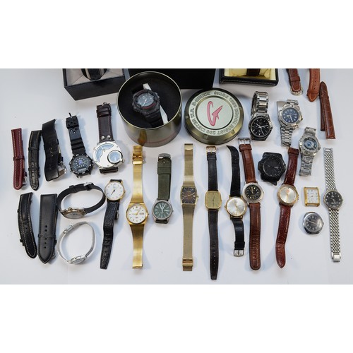 35 - A collection of fashion watches to include G Shock, WR200M, tin, Guess and Wingmaster, spares or rep... 