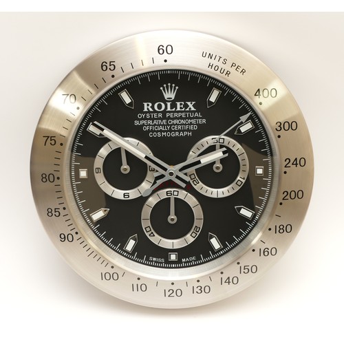 50 - A 'Rolex' style advertising metal wall clock, black dial 'Rolex Daytona Cosmograph', having quartz m... 