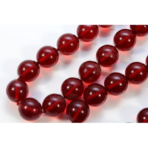 78 - A cherry amber Bakelite beaded necklace, 15mm bead, 80cm total, 153g