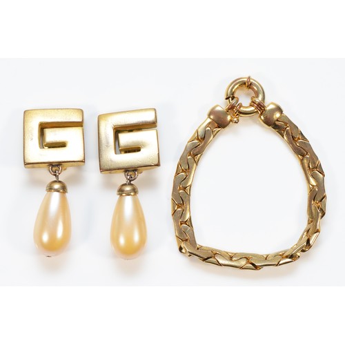 85 - Givenchy, a pair of gilt metal and imitation pearl clip on earrings, 55mm, with a Givenchy gilt meta... 