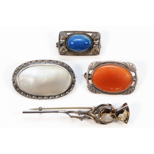 90 - Four sterling silver gemset brooches to include an Arts & Crafts example and another in the shape of... 