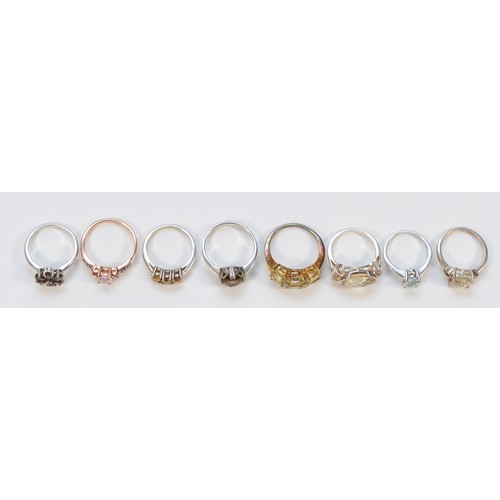 92 - Eight sterling silver gemset rings to include citrine and smokey quartz examples, varying sizes from... 