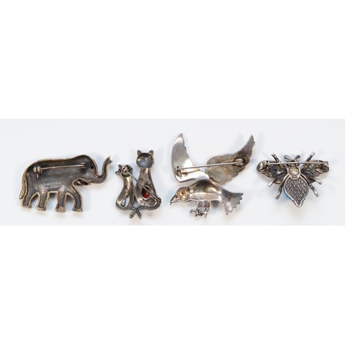 95 - Four silver and marcasite brooches in the form of animals, 48g