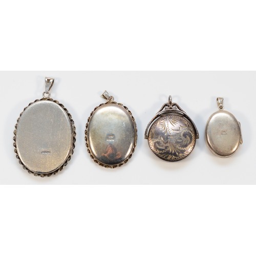 97 - Four English hallmarked silver lockets to include 1970s examples, an etched design and a swivel lock... 