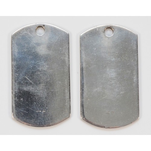 104 - A pair of 925 silver Gucci dog tag pendants, 50mm x 25mm, 36g