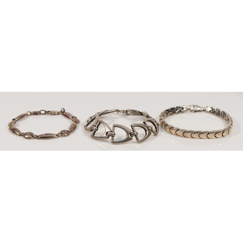 106 - A French silver stirrup bracelet, bearing control marks, 18cm, replacement clasp, with two 925 silve... 