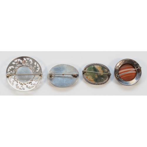 108 - Robert Allison, a silver mounted agate brooch, 35mm, with three other silver mounted agate brooches,... 