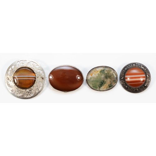 108 - Robert Allison, a silver mounted agate brooch, 35mm, with three other silver mounted agate brooches,... 