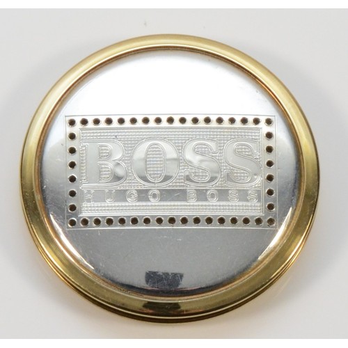 110 - Hugo Boss, a 925 silver and gilt, scent compact, 42mm, with scent pad, 21g