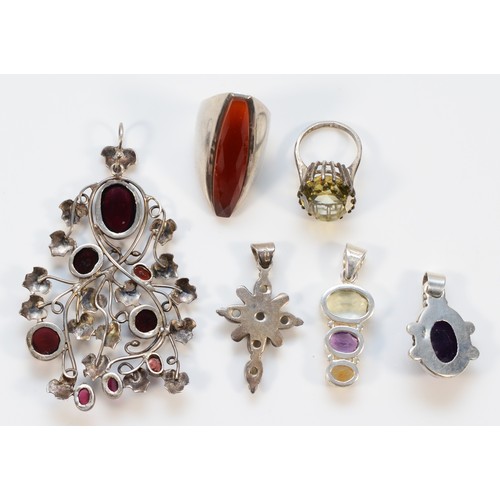 119 - A 925 silver Arts & Crafts style pendant with cabochon cut garnets, 80mm, three 925 silver and gemse... 