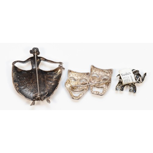 123 - A 925 silver brooch in the form of a dancer, 60mm, with two smaller 925 silver brooches of an elepha... 