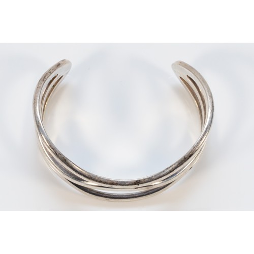 132 - Emporio Armani, a 925 silver cuff bangle, wave design, 58mm, 51g