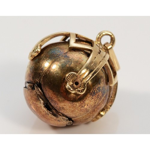 138 - A 9ct gold and silver Masonic ball pendant, 12g