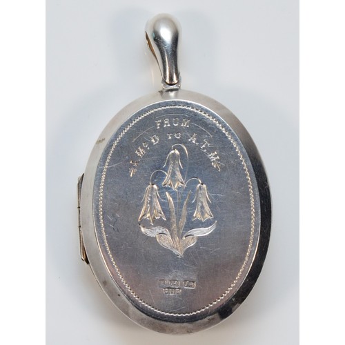 148 - A 925 silver locket, with engraving to verso and buckle detail to the front, Birmingham 1879, 18g