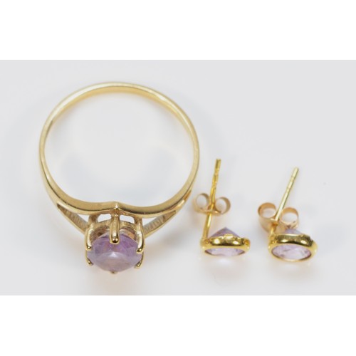 203 - A 9ct gold amethyst solitaire ring, K 1/2, together with a pair of 9ct gold amethyst earrings with s... 