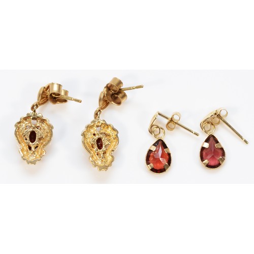 204 - Two pairs of 9ct gold garnet drop earrings, 2.5g