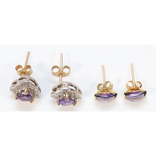 205 - A pair of 9ct gold amethyst and diamond heart shaped earrings, together with a pair of 9ct gold amet... 