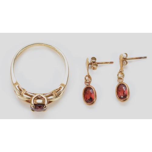 207 - A 9ct gold garnet solitaire ring, N, together with a pair of 9ct gold garnet drop earrings, 3g