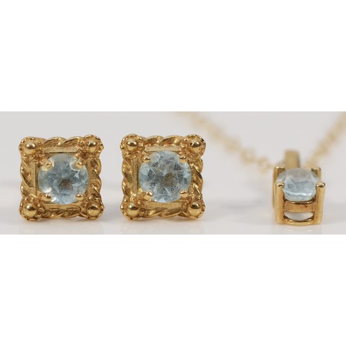 209 - A pair of 9ct gold blue gemstone earrings with scroll backs, together with a 9ct gold blue gemstone ... 