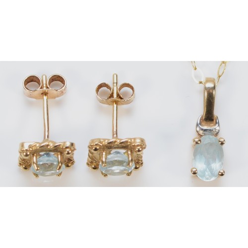 209 - A pair of 9ct gold blue gemstone earrings with scroll backs, together with a 9ct gold blue gemstone ... 