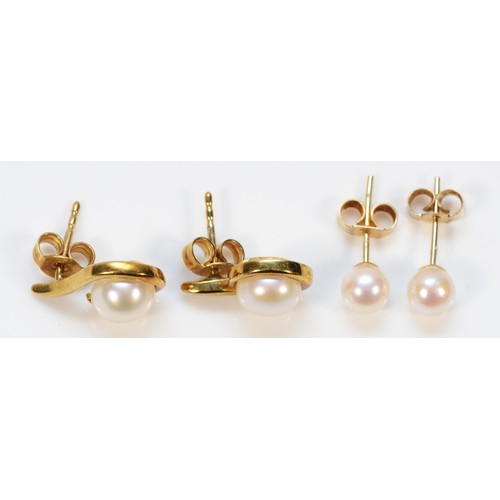 213 - Two pairs of 9ct gold and cultured pearl earrings with scroll backs, 3.6g