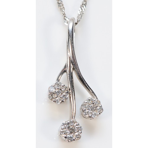 221 - A 9ct white gold and diamond drop pendant with a chain, 25mm, 2.3g