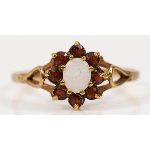 230 - A 9ct gold opal and garnet floral cluster ring, O 1/2, 1.5g