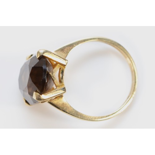 233 - A 9ct gold smokey quartz cocktail ring, 15mm x 12mm, N, 4.2g