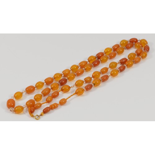 234 - A 9ct gold clasp amber and clear gemstone beaded necklace, 34.6g