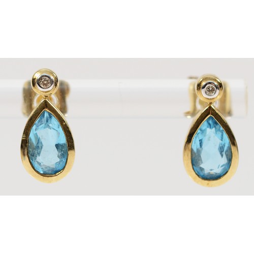 241 - A pair of 9ct gold diamond and blue gemstone earrings with scroll backs, 2.2g