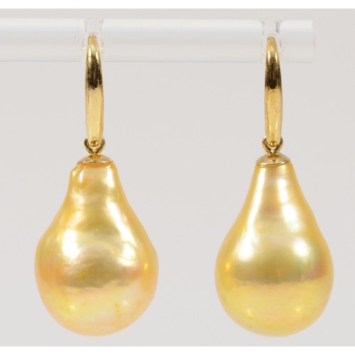 243 - A pair of 14k gold baroque pearl earrings, 20mm drop, 9.7g