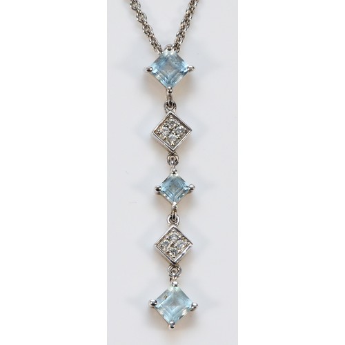 256 - A 9ct white gold diamond and blue gemstone drop pendant, with a chain, 35mm, 3.9g