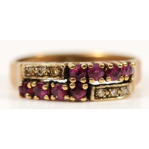 260 - A 9ct gold ruby and diamond two row ring, M, visible resizing mark to the band, 2.5g