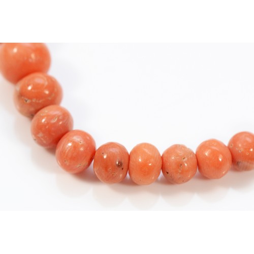 266 - A 9ct gold clasp beaded coral necklace, graduating bead size, largest 6mm, 12.3g