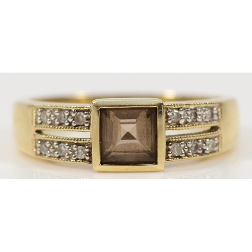 268 - A 9ct gold diamond and smokey quartz dress ring, M, 3g