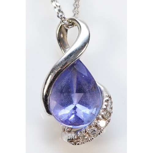 272 - A 9ct white gold tanzanite and diamond pendant, 13mm, 1.4g