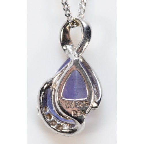 272 - A 9ct white gold tanzanite and diamond pendant, 13mm, 1.4g