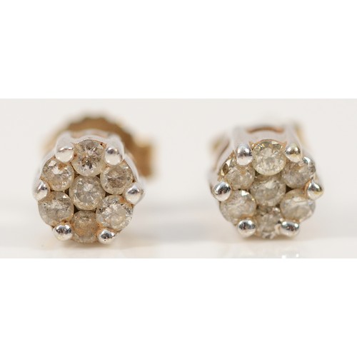 273 - A pair of 9ct gold diamond cluster earrings with scroll backs, 1.1g