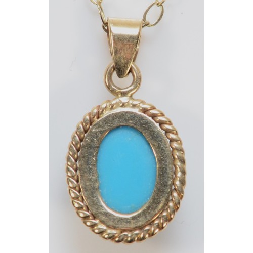 286 - A 9ct gold cabochon cut turquoise pendant with a chain, 1g