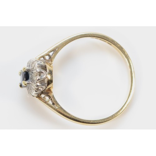 298 - A 9ct gold sapphire and diamond cluster ring, London 1976, N 1/2, 2.8g