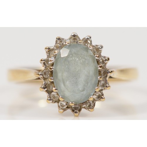 300 - A 9ct gold blue gemstone and diamond cluster ring, L, 2.4g