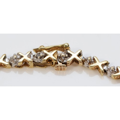 323 - A 9ct gold diamond bracelet, 18cm, 3.4g